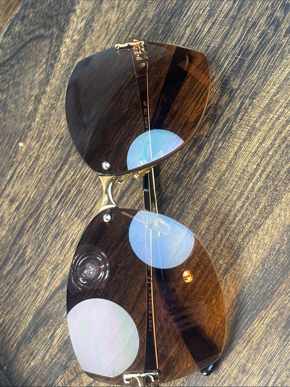 Tory Burch Brown Gradient Rimless Sunglasses with Gold Accents and Orange Case - Picture 9 of 10